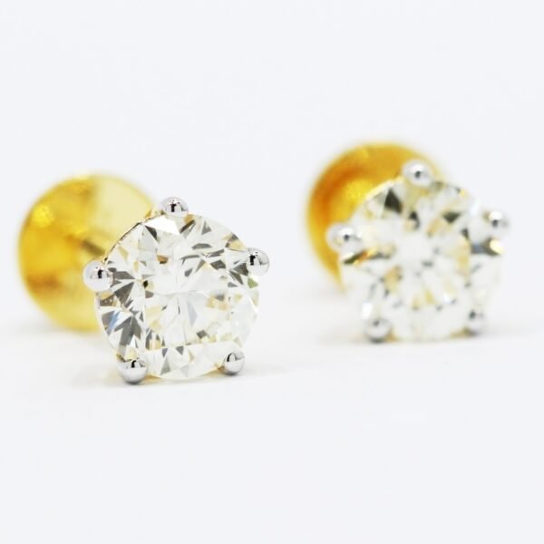 Diamond studs featuring perfectly cut diamonds in a classic design from Devasurendra Gems & Jewellers - dgandj.com.