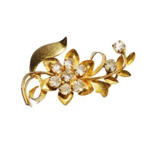 Estate brooches featuring classic designs and fine gemstones from Devasurendra Gems & Jewellers - dgandj.com.