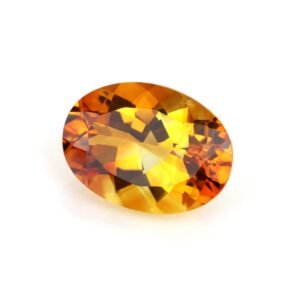 Luxurious imperial topaz featuring its golden-orange hue and stunning brilliance, showcased at Devasurendra Gems & Jewellers. Discover more at https://dgandj.com/